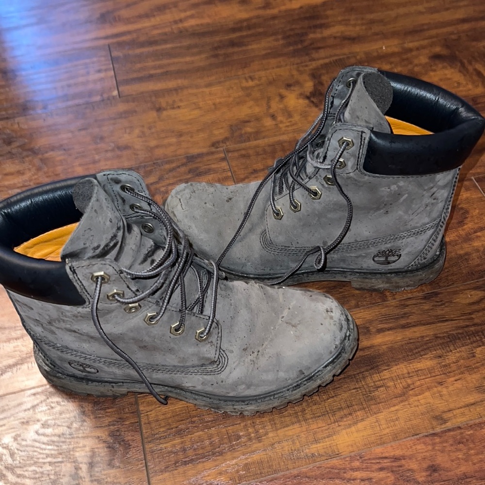 Gray and black Timberland boots